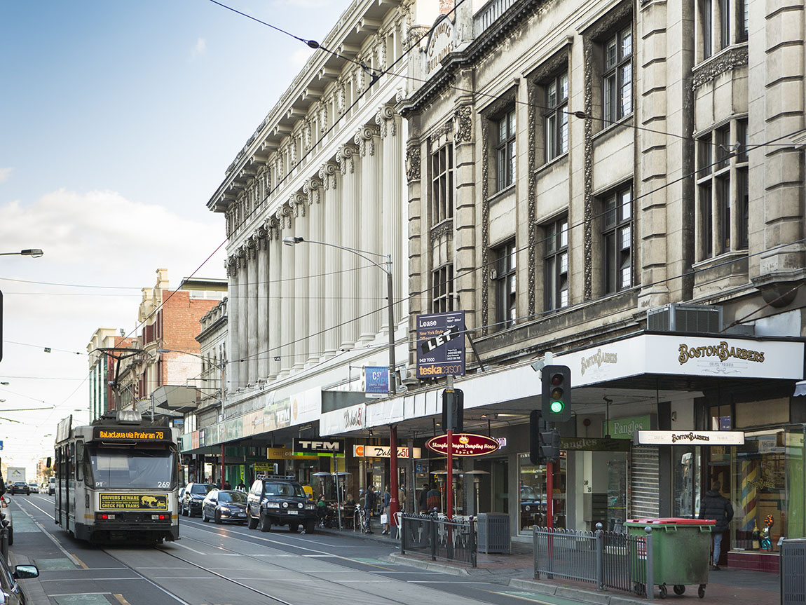 Tram and heritage shopfronts on Chapel Street in Prahran