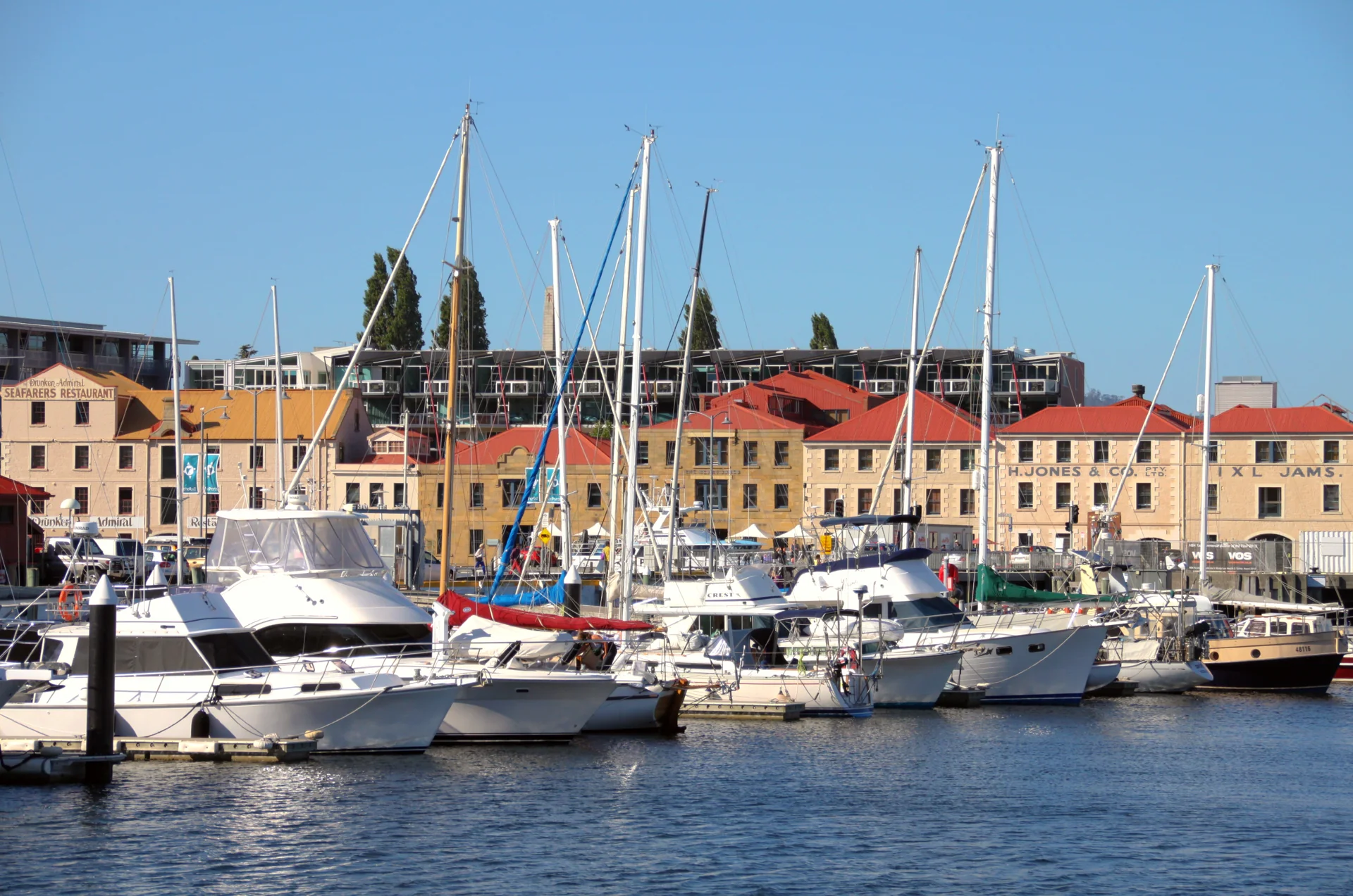 Boats moored in front of the sandstone warehouses on Hobart's waterfront