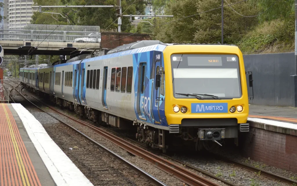 Metro train arriving at Jolimont Station