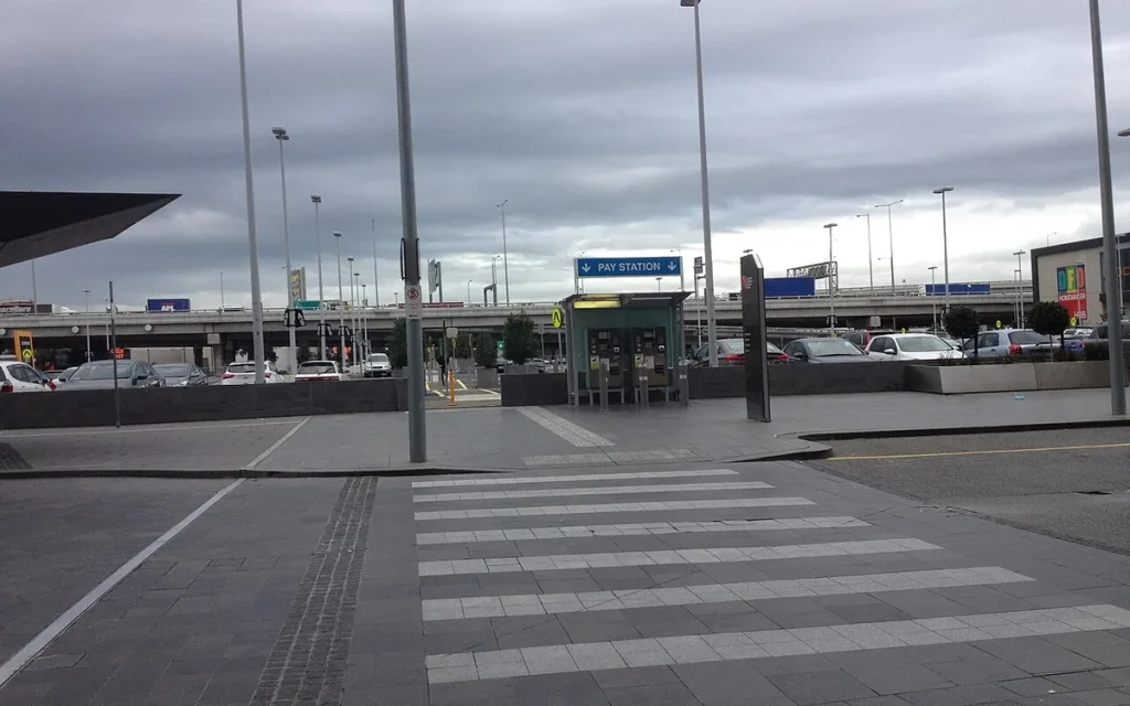 Pay station and parked cars at Melbourne Convention Centre car park